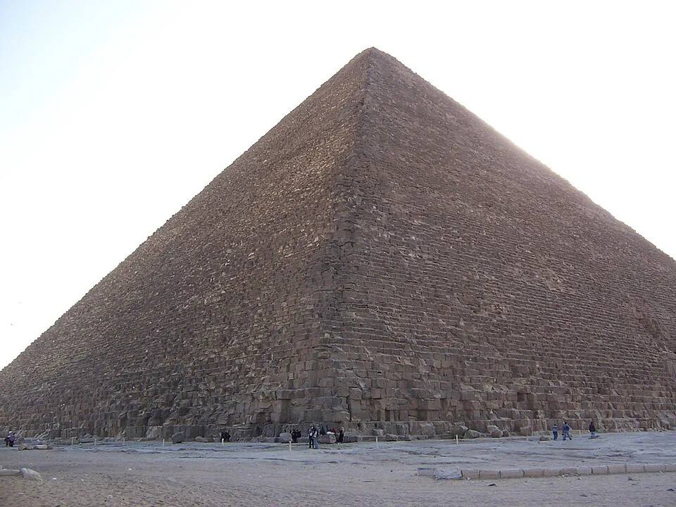 The Great Pyramid of Giza against a pale sky